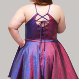 Shimmer satin fabric knee length party dress with halter neckline, full A-line skirt and center-back zipper.