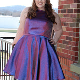 Shimmer satin fabric knee length party dress with halter neckline, full A-line skirt and center-back zipper.