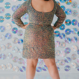 Sydney's CLoset SC8111 short plus size part y  dress with deep V-neckline, long sleeves and high slit. Multi dimensional sequins and ruched bodice. 