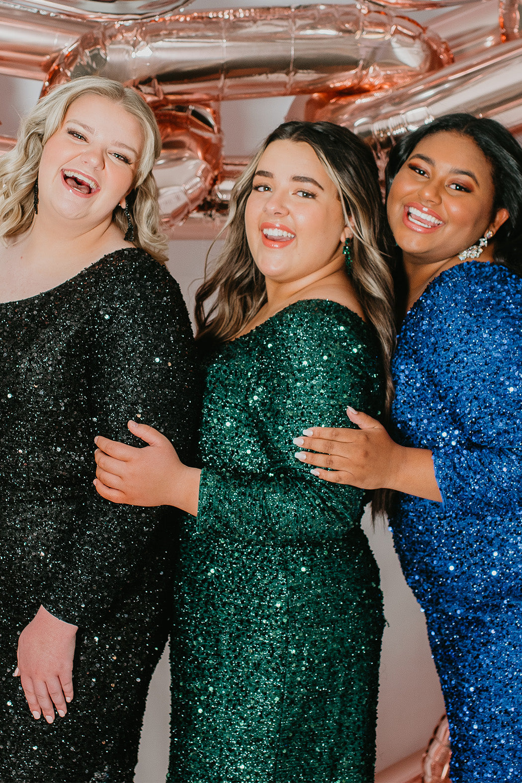 This is SC8112 in our Sydney's Closet Homecoming collection. This plus size party dress comes in green, black, white, red, and blue! This dress has one shoulder long sleeve, natural waistline, and a scoop neckline. This fitted all over sequin dress has a small slit above the right knee! This gown is set in stone for this homecoming season!