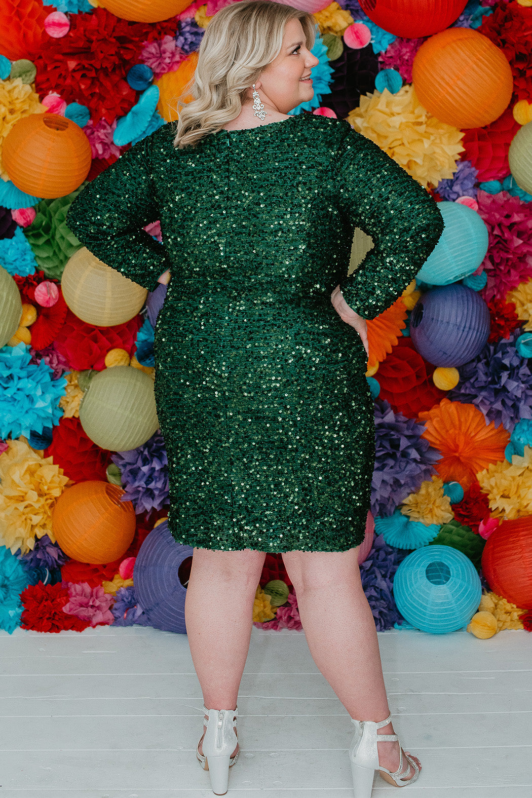 Sydney's Closet Style SC8113 plus size sequin party dress with long sleeves, scoop nekcline and slit. Available in blue, red, black and forest green.