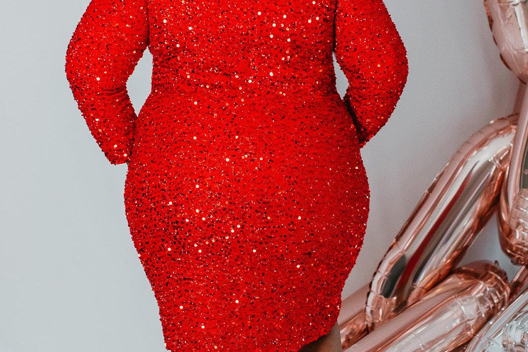 Sydney's Closet Style SC8113 plus size sequin party dress with long sleeves, scoop nekcline and slit. Available in blue, red, black and forest green.