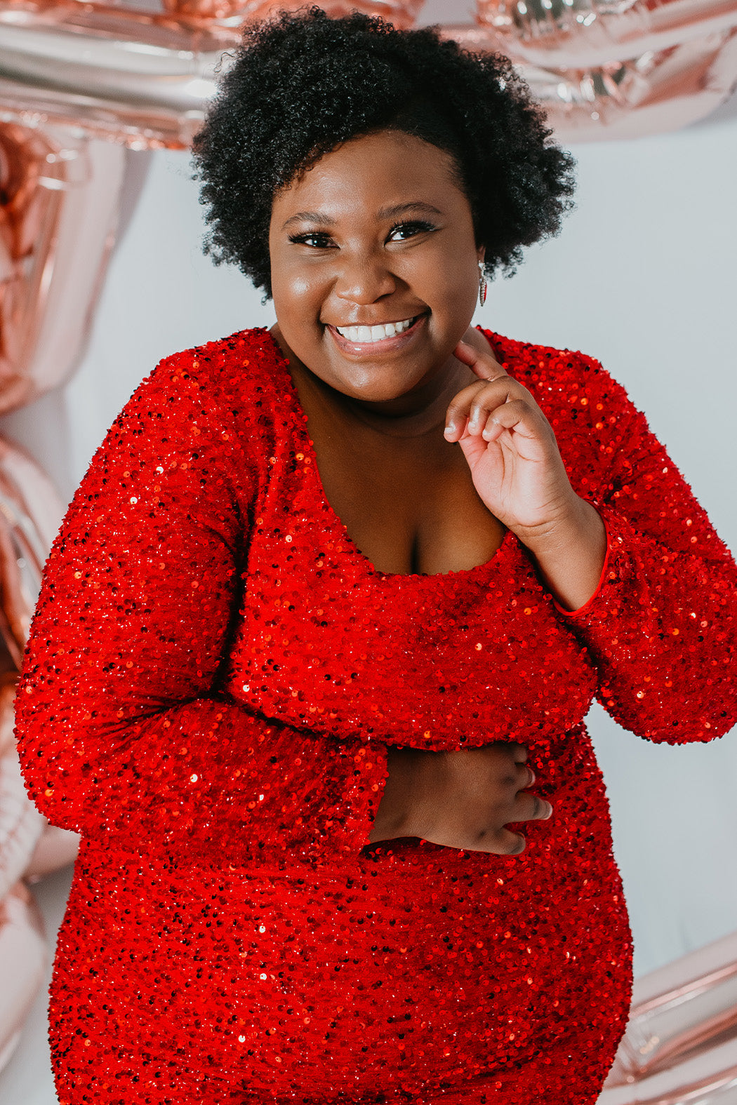 Sydney's Closet Style SC8113 plus size sequin party dress with long sleeves, scoop nekcline and slit. Available in blue, red, black and forest green.