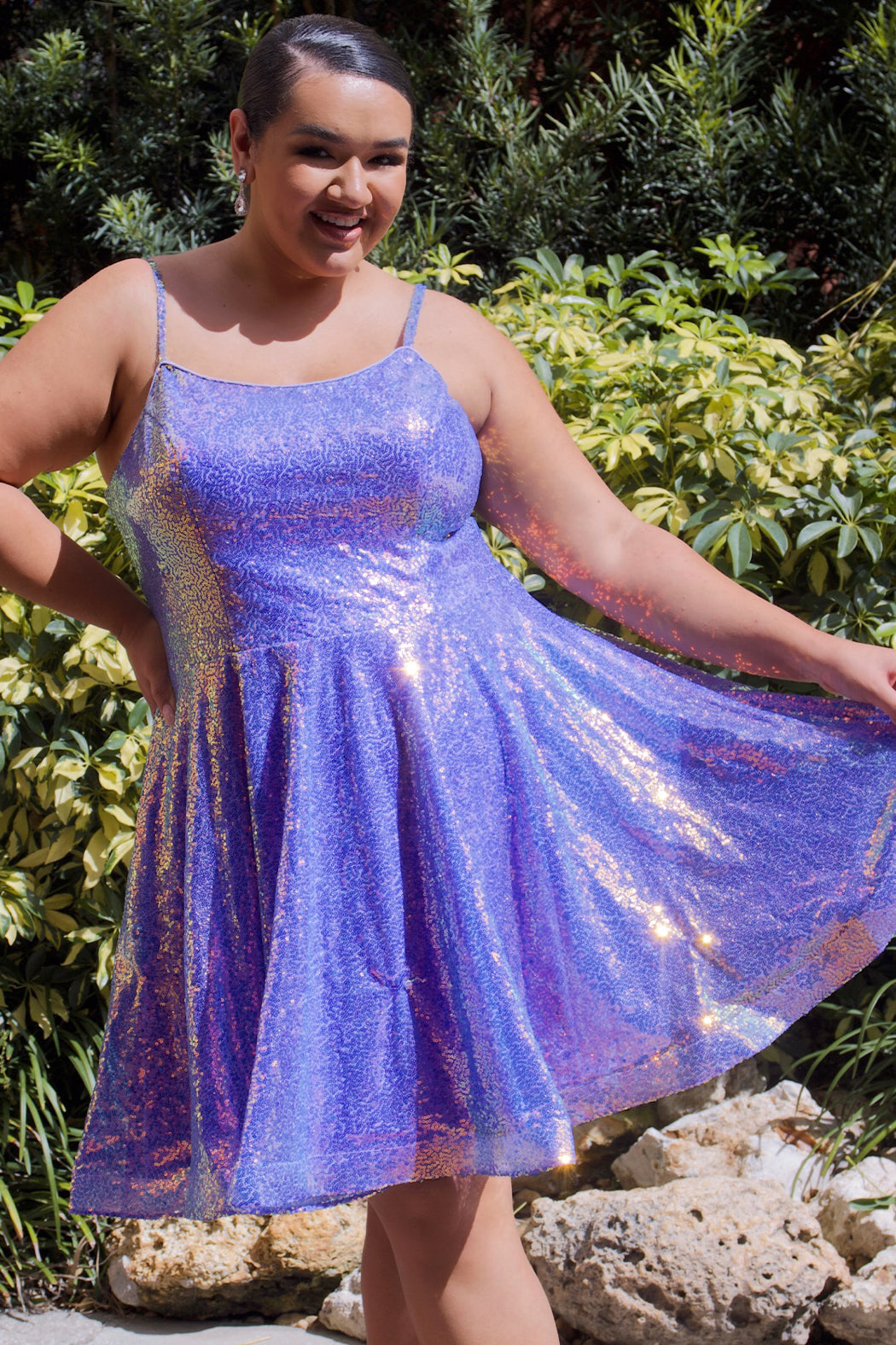 This is SC8122 in our Sydney's Closet Homecoming collection. This plus size party dress comes in white, red, blue, light blue, green, and purple! This dress has straps covered in sequins, a scoop neckline, and a natural waistline. This a-line all over sequins dress has a horsehair hem so that you can dance the night away! To make it even more spectacular, we have added pockets to make this the perfect dress for homecoming season!