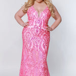 Tease Prom style number TE2205 Pink fit and flare dress with pink sequins, a v-neckline, and spaghetti straps that lace into the back.