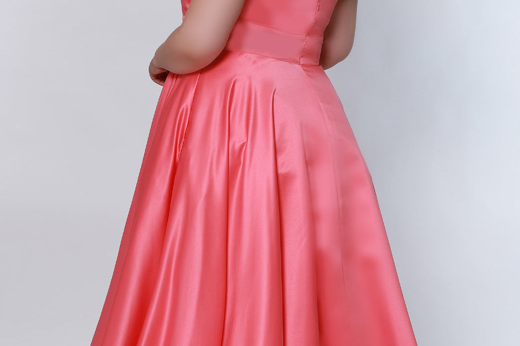 Tease Prom TE2209 Back view Plus size satin a-line dress in coral with spaghetti straps, a deep v-neckline and a slit.