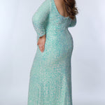 Tease Prom TE2308 Aqua. Fitted silhouette, V-neckline, a pleated bodice, empire waistline with a slit on right side of skirt. Includes a 5 inch sweep train and bra-friendly with long sleeves. an invisible zipper, scoop back and multi-dimensional sequins over a stretch knit lining.