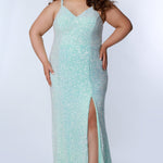 Tease Prom TE2309 Seafoam green. Slim, mermaid silhouette with V-neckline and a natural waistline. Stretch sequins over a stretch knit lining. V-back, ½  inch thick straps. A slim skirt with a slit on the left and sweep train.