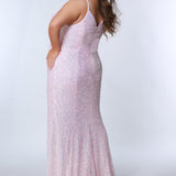 Tease Prom TE2309 Pink pearl. Slim, mermaid silhouette with V-neckline and a natural waistline. Stretch sequins over a stretch knit lining. V-back, ½  inch thick straps. A slim skirt with a slit on the left and sweep train.