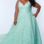 Tease Prom TE2314 Mint Green.  Fully lined, A-line silhouette, natural waistline  and V-neckline.Ball gown skirt with pockets. Tulle with leaf lace appliques with hot fix stones. Half inch straps covered in lace. Long invisible center back zipper and a detachable self belt. 