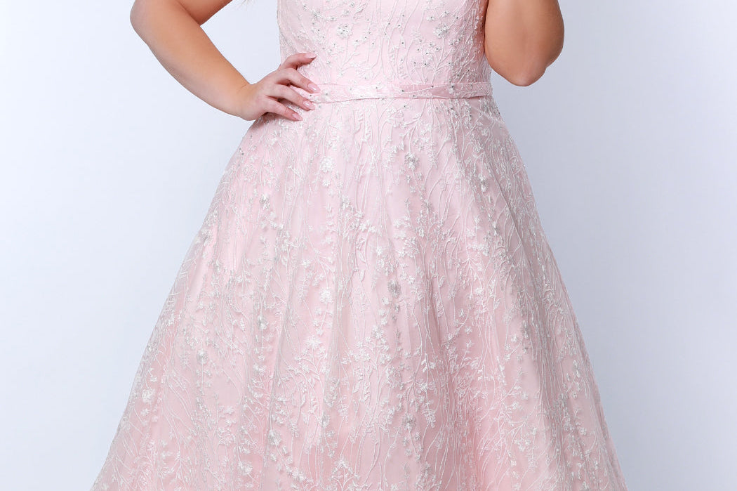 Tease Prom TE2314 soft pink. Fully lined, A-line silhouette, natural waistline  and V-neckline.Ball gown skirt with pockets. Tulle with leaf lace appliques with hot fix stones. Half inch straps covered in lace. Long invisible center back zipper and a detachable self belt. 