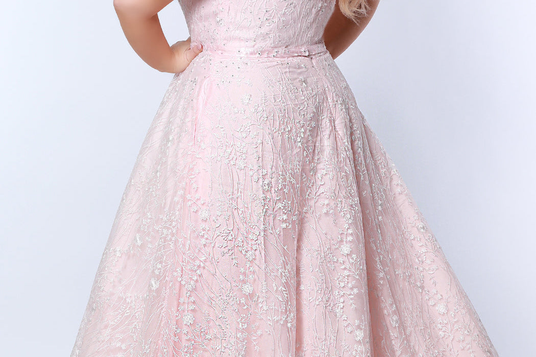 Tease Prom TE2314 soft pink.  Fully lined, A-line silhouette, natural waistline  and V-neckline.Ball gown skirt with pockets. Tulle with leaf lace appliques with hot fix stones. Half inch straps covered in lace. Long invisible center back zipper and a detachable self belt. 