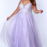 Tease Prom TE2315 light purple.  A-line silhouette, natural waistline  and V-neckline. Sparkle tulle and leaf lace appliques with sequins. Half inch straps covered in lace. Long invisible center back zipper and a detachable self belt. 