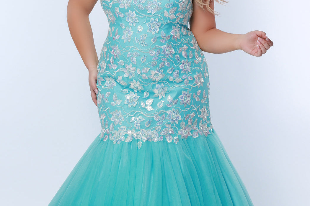 Tease Prom TE2316 aqua blue. Mermaid silhouette, scoop neckline. Sparkle tulle and leaf lace appliques with sequins. Half inch straps covered in lace. Tulle skirt and long invisible center back zipper. 