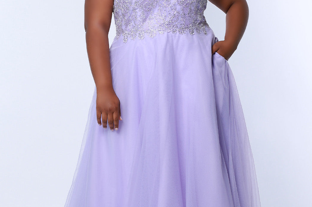 Tease Prom TE2317 Lavender purple.  A-line silhouette with a natural waistline, V-neckline and V-back. Metallic lace over satin lining. Off-the-shoulder straps with elastic band, chiffon skirt with pockets and crinoline. Center back zipper. .