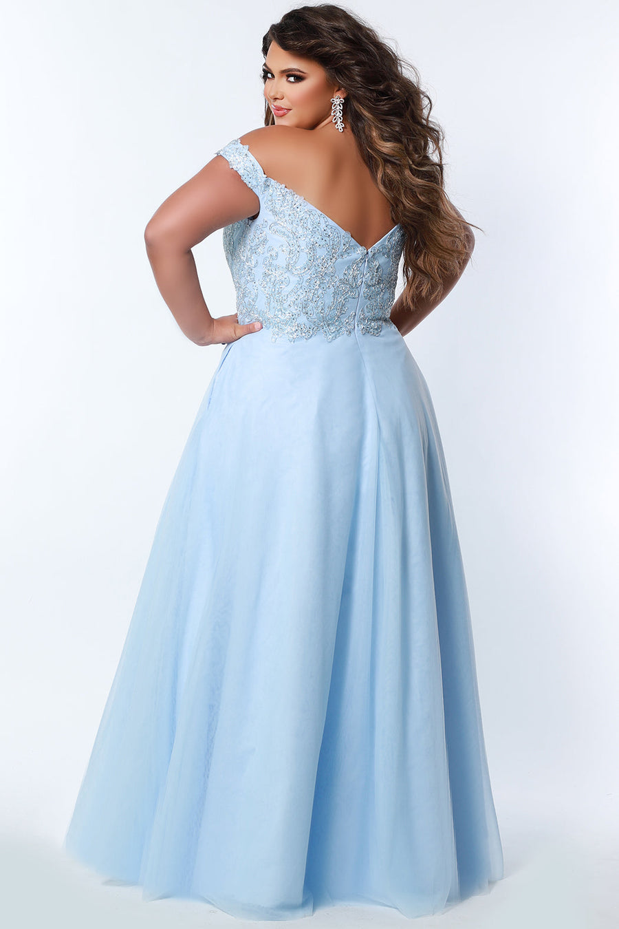 Tease Prom TE2317 Powder blue. A-line silhouette with a natural waistline, V-neckline and V-back. Metallic lace over satin lining. Off-the-shoulder straps with elastic band, chiffon skirt with pockets and crinoline. Center back zipper. .