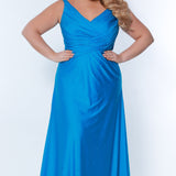 Tease Prom TE2318 electric blue. Fit and Flare silhouette with a natural waistline and fitted skirt. V-neckline and V-bodice with pleats. Stretch lycra with hot fix stones. Sleeveless, bra-friendly straps, sweep train and a center back zipper. 