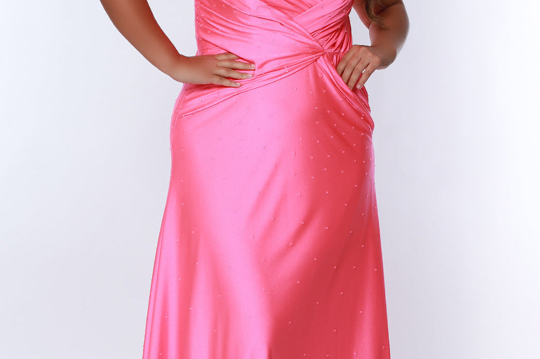 Tease Prom TE2318 Hot pink. Fit and Flare silhouette with a natural waistline and fitted skirt. V-neckline and V-bodice with pleats. Stretch lycra with hot fix stones. Sleeveless, bra-friendly straps, sweep train and a center back zipper. 