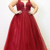 Tease Prom TE2323 Burgundy red. Ballgown silhouette with a full A-line tulle skirt. Natural waistline and a sweetheart neckline and bra-friendly straps. Heavily beaded bodice with tone-on-tone beading on lace appliques. Embroidered lace and sparkle tulle skirt with pockets. Lace-up back with modesty panel. 