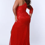 Tease Prom TE2325 Ruby red. Slim/Fitted Silhouette with a Slim skirt. Natural waistline with a One-shoulder neckline and Sheer long sleeve. Lace appliques, Sequins and a center back zipper. Partially lined, with a high slit, a sweep train and horsehair hem. 
