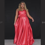 Sydney’s Closet SC7355 in lime green. Full A-line silhouette with a Sweetheart neckline and spaghetti straps. Has a lace up back, modesty panel and fully lined skirt with pockets and a slit. Offered in apricot orange, lemon yellow, lime green and raspberry pink.