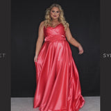 Sydney’s Closet SC7355 in lime green. Full A-line silhouette with a Sweetheart neckline and spaghetti straps. Has a lace up back, modesty panel and fully lined skirt with pockets and a slit. Offered in apricot orange, lemon yellow, lime green and raspberry pink.